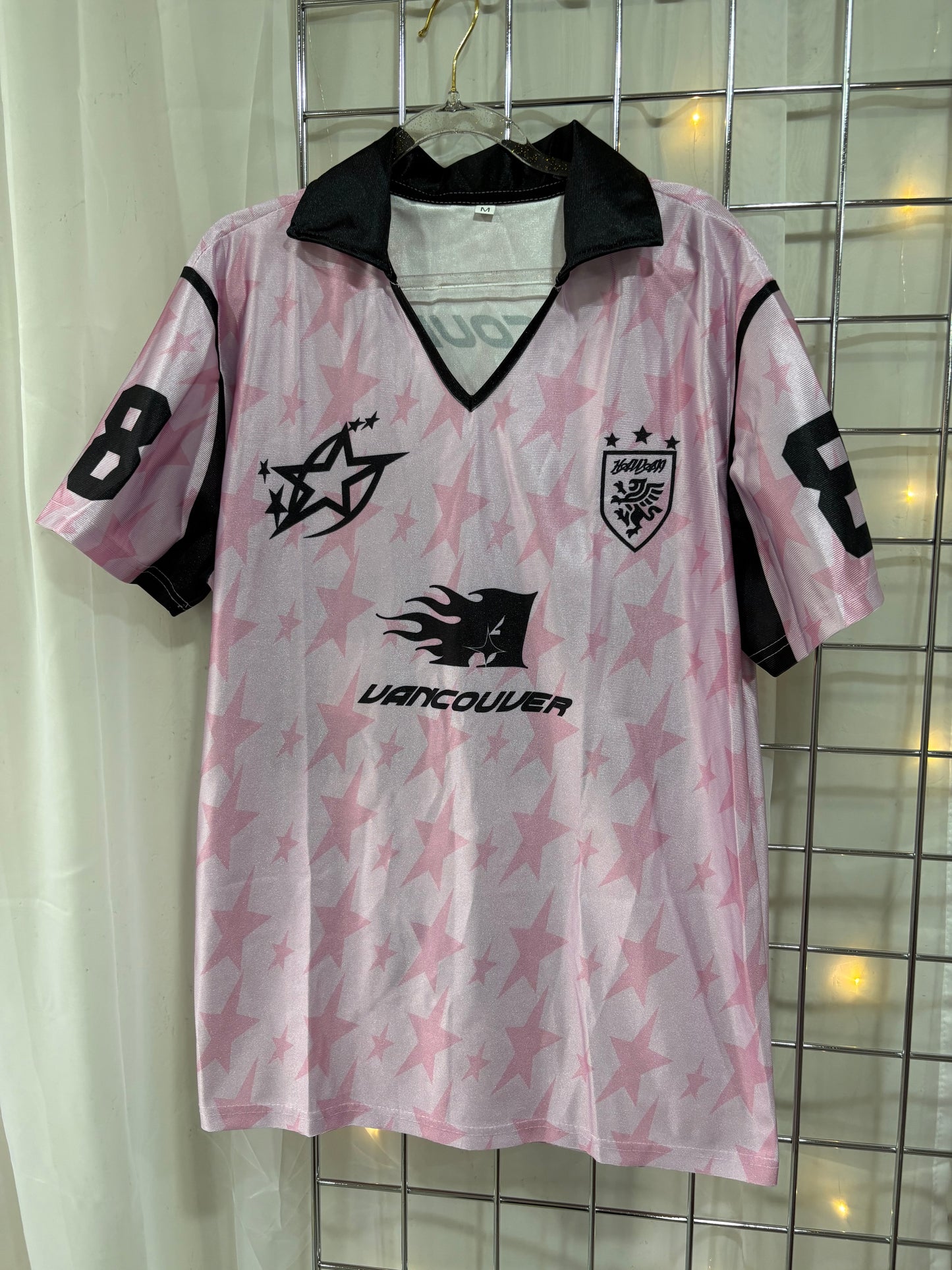 Sale item collared pink and black jersey